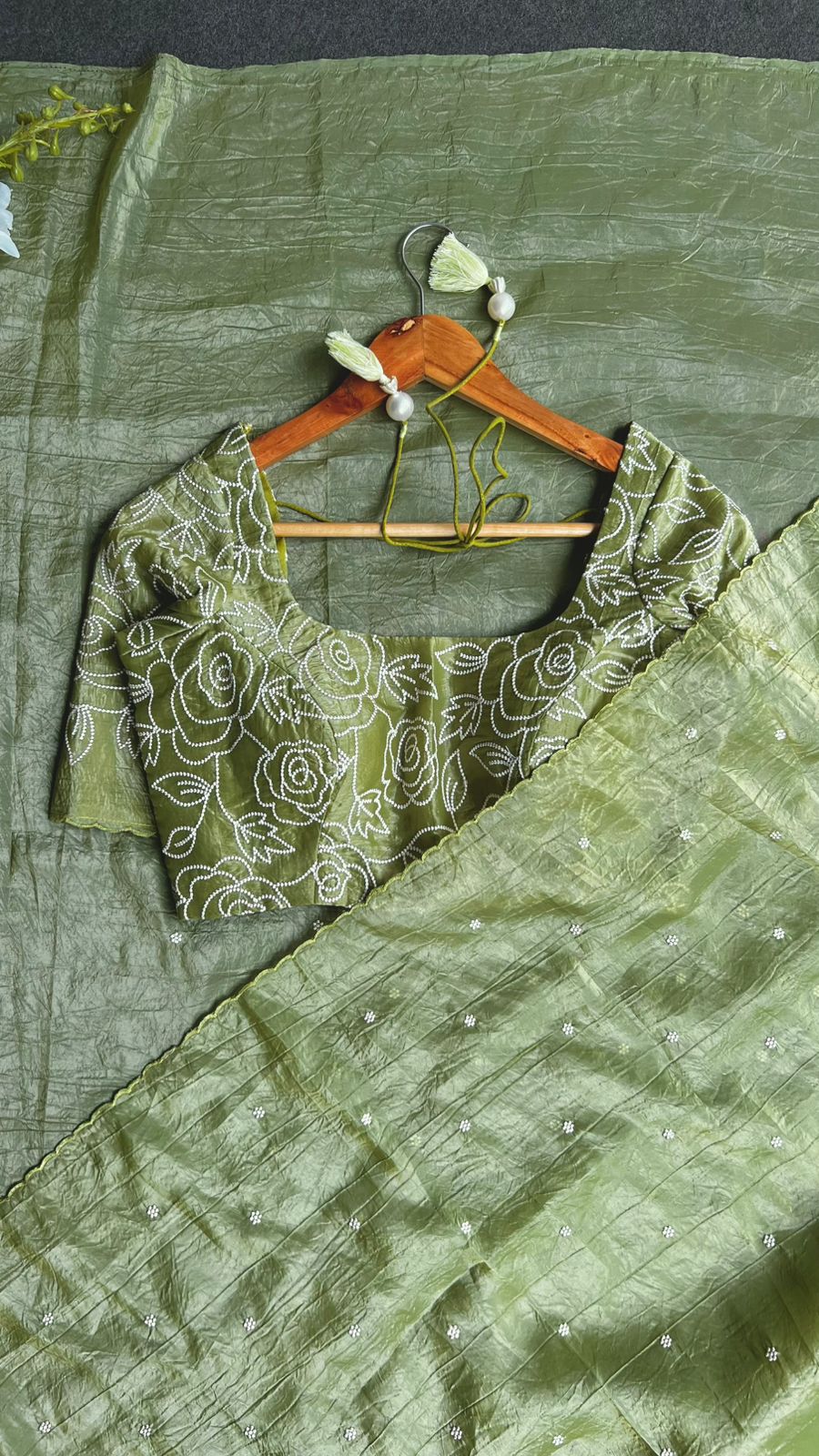 Green silk tissue saree with embroidered blouse