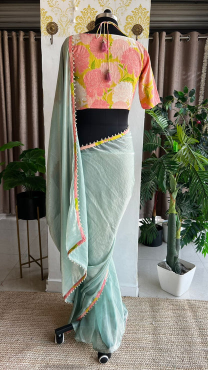 Sea blue glass tissue saree with floral hand work blouse