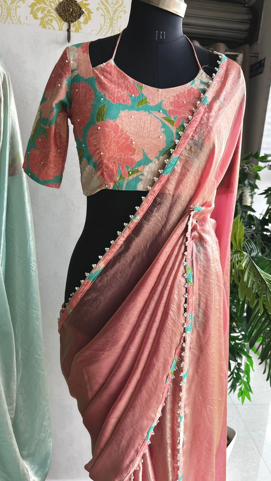 Peach glass tissue saree with floral hand work blouse