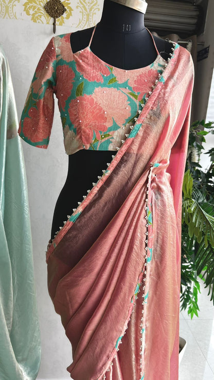 Peach glass tissue saree with floral hand work blouse