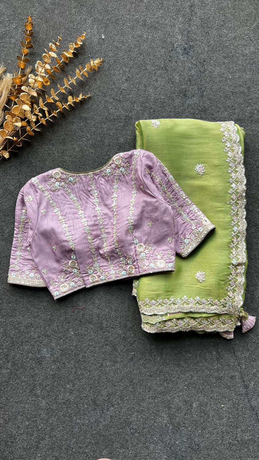 Green tissue saree with lavender embroidered blouse