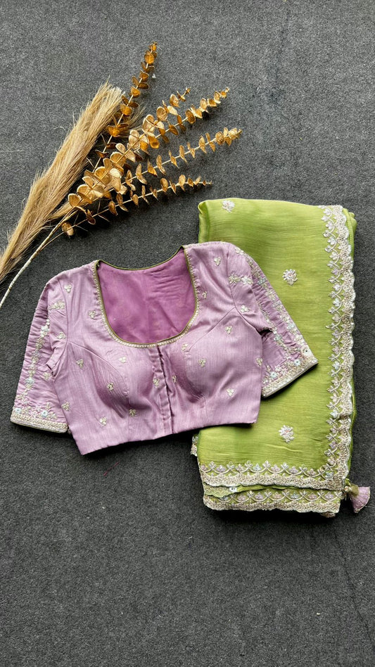 Green tissue saree with lavender embroidered blouse