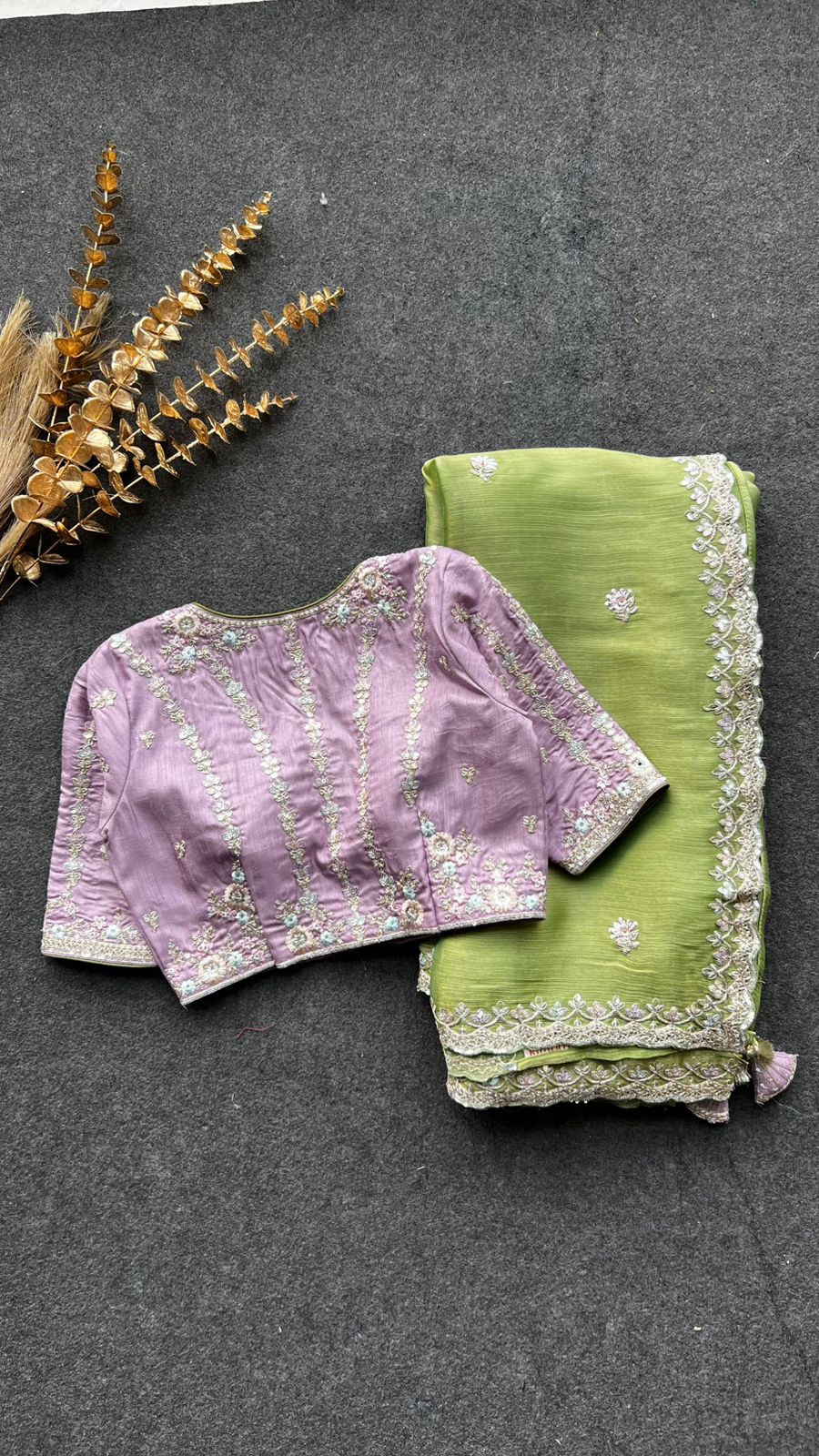 Green tissue saree with lavender embroidered blouse