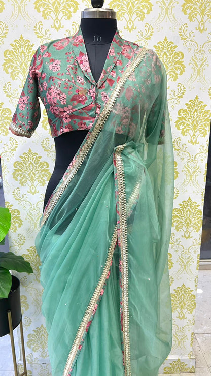 Cyan blue organza saree with floral collar blouse