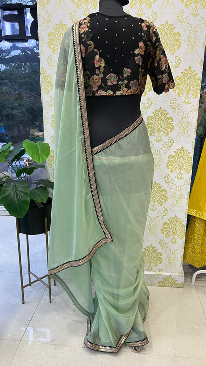 Mint organza saree with floral handwork blouse