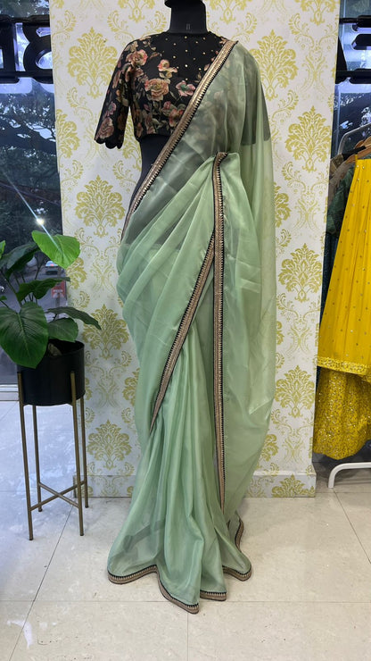 Mint organza saree with floral handwork blouse