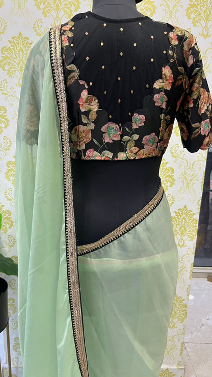 Mint organza saree with floral handwork blouse