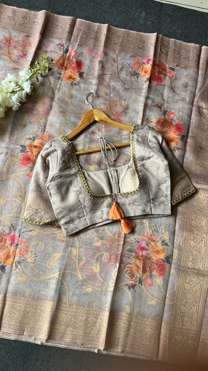 Light grey floral organza saree with hand worked blouse