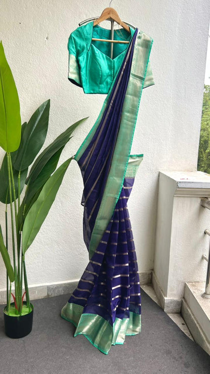 Blue stripped kota saree with cyan blue blouse