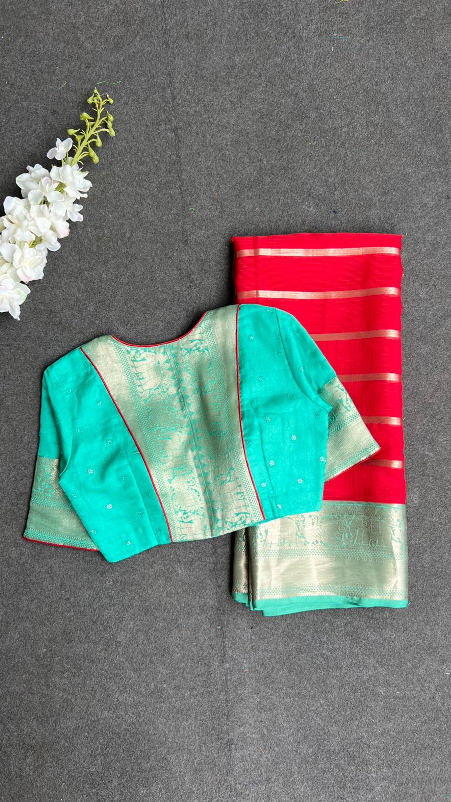 Red stripped kota saree with cyan blue blouse