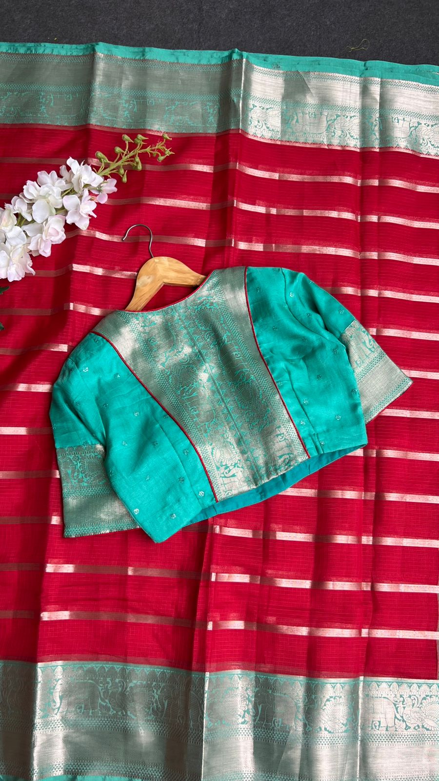 Red stripped kota saree with cyan blue blouse