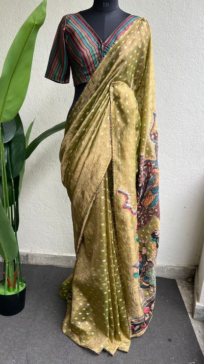 Mehandi green tissue saree with stripped hand work blouse