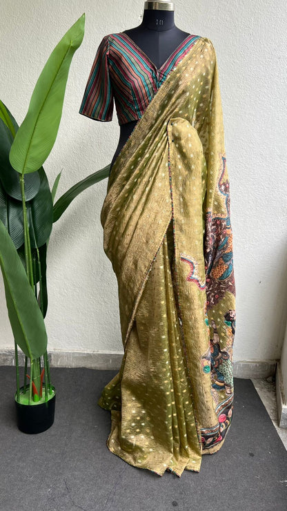 Mehandi green tissue saree with stripped hand work blouse