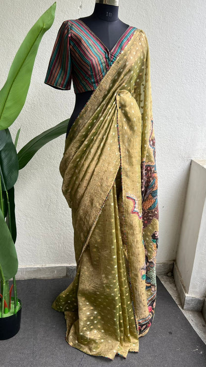 Mehandi green tissue saree with stripped hand work blouse