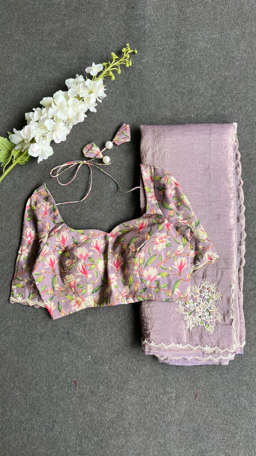 Lavender tissue saree with floral hand work blouse