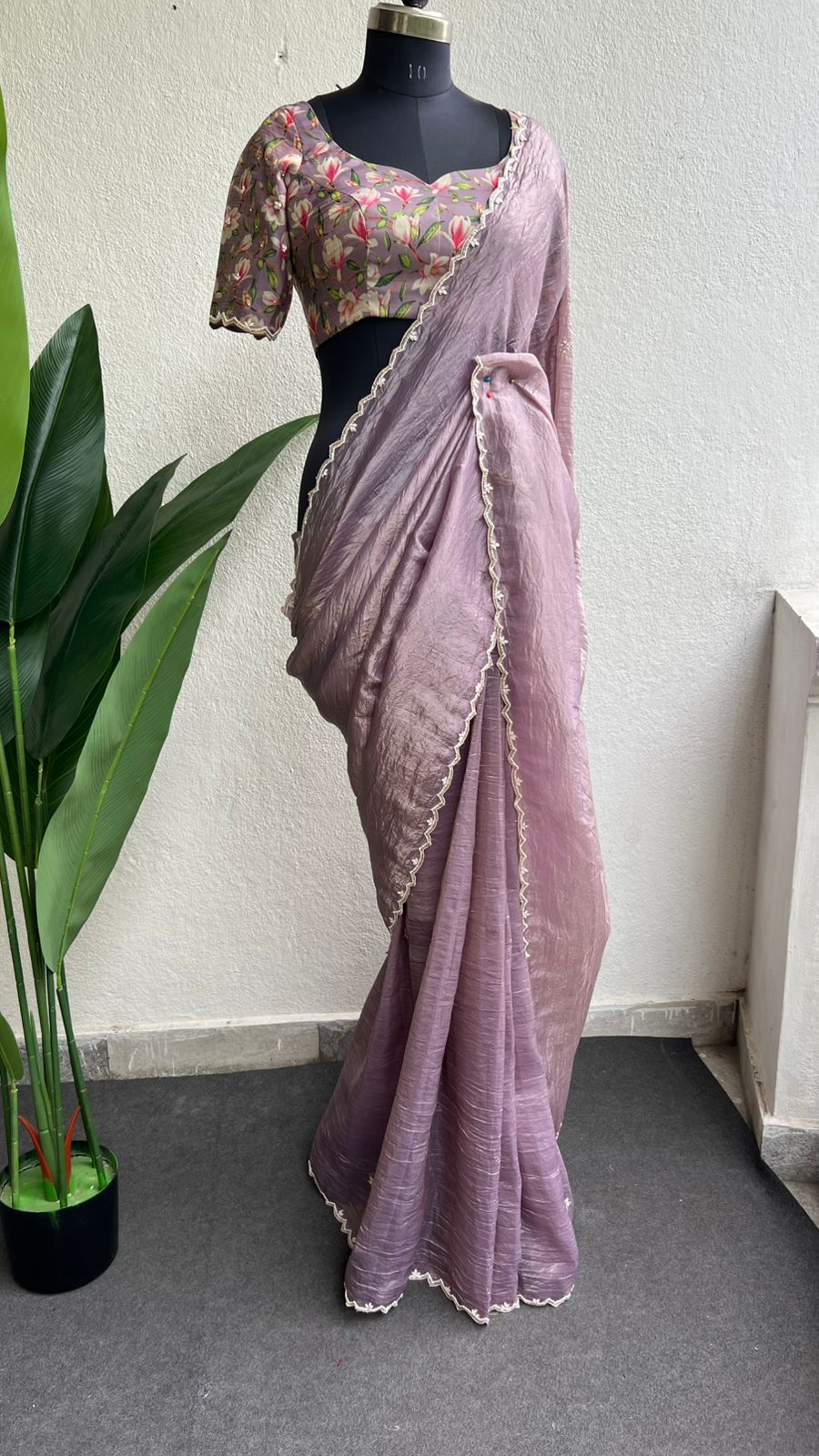 Lavender tissue saree with floral hand work blouse