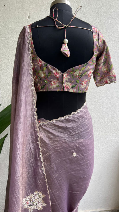 Lavender tissue saree with floral hand work blouse