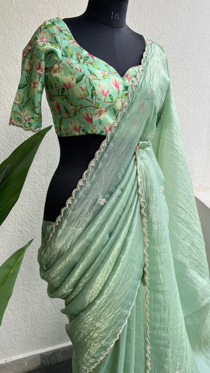 Pista green tissue saree with floral hand work blouse