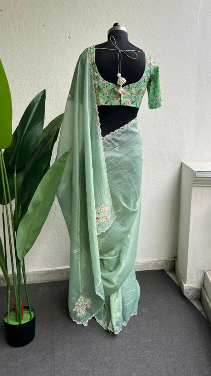 Pista green tissue saree with floral hand work blouse