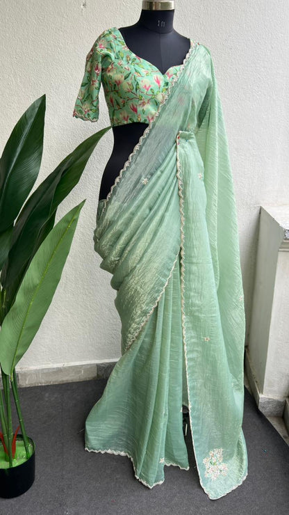 Pista green tissue saree with floral hand work blouse