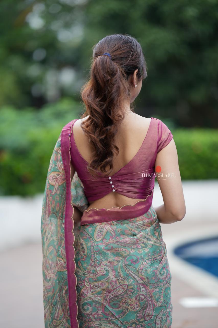 Jade green viscose jute saree with pink tissue blouse