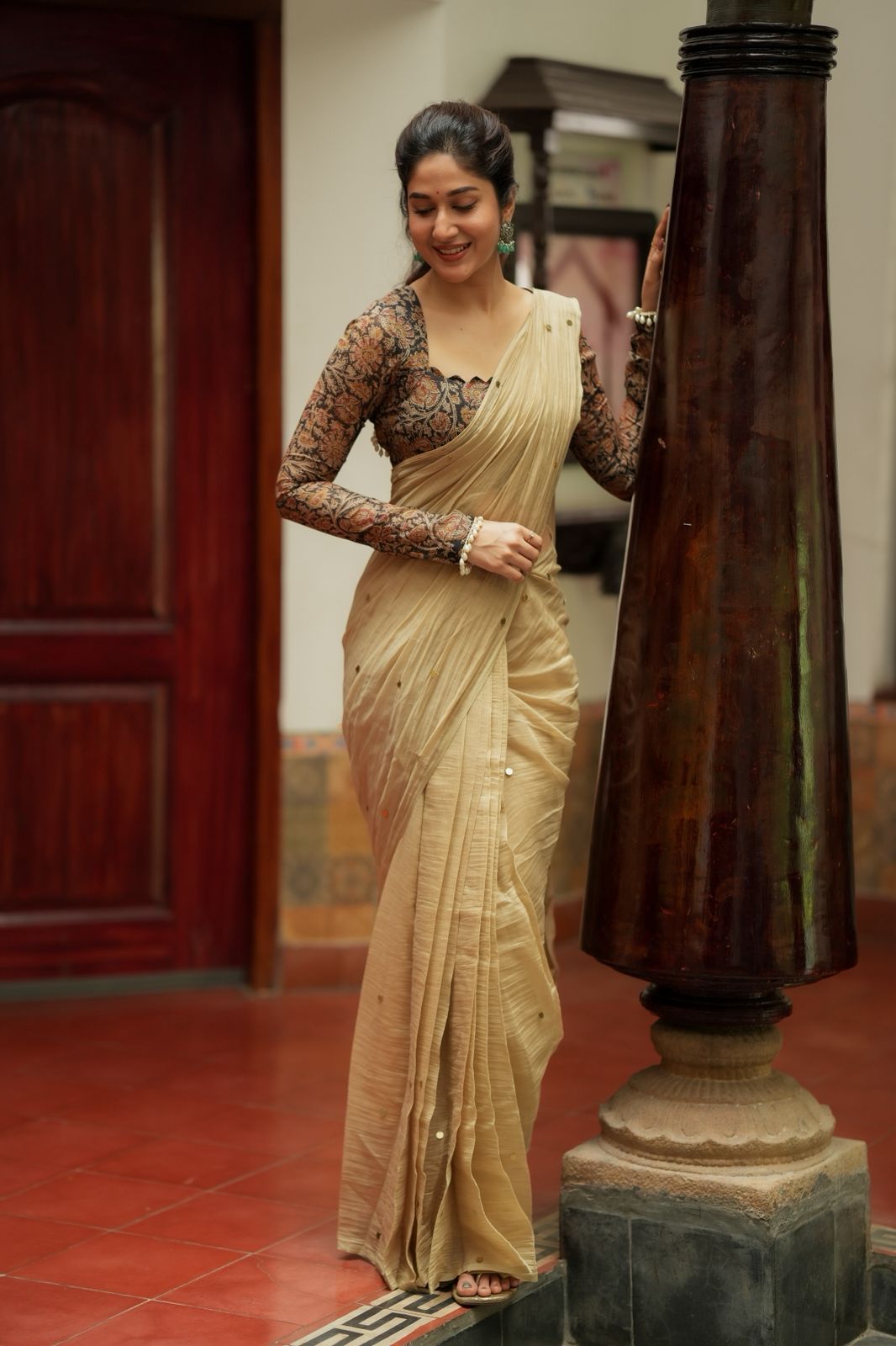 Cream malai chanderi saree with Ajrak print blouse