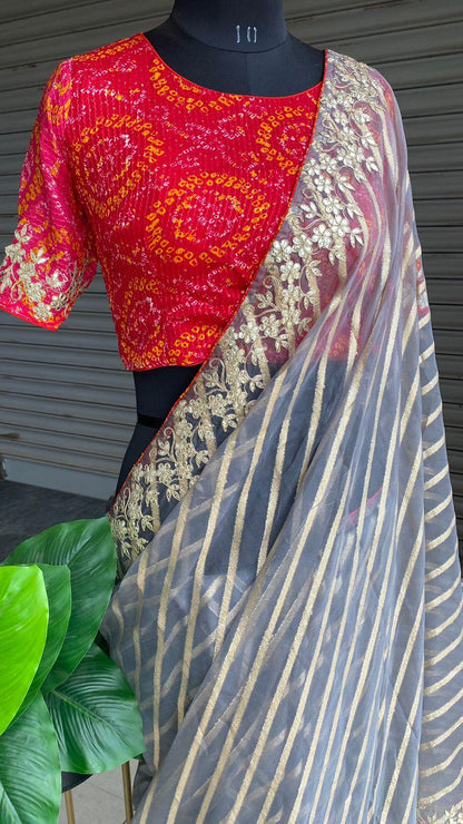 Striped grey organza saree with chiffon embroidery blouse - Threads