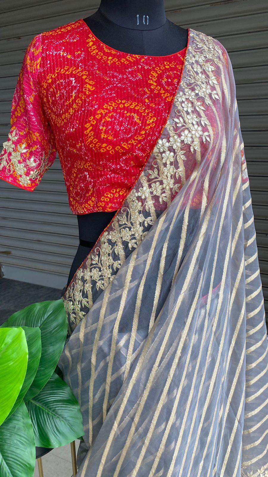Striped grey organza saree with chiffon embroidery blouse - Threads