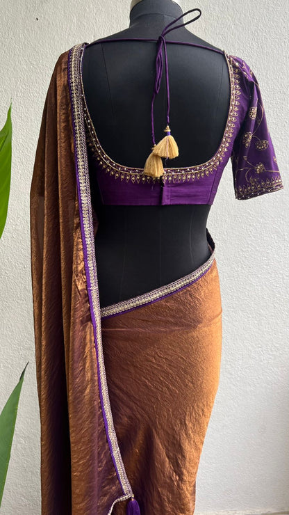 Coffee tissue saree with purple heavy hand work blouse