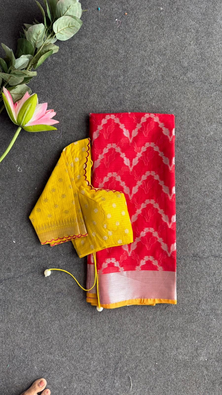 Red soft kota silk saree with yellow embroidered blouse