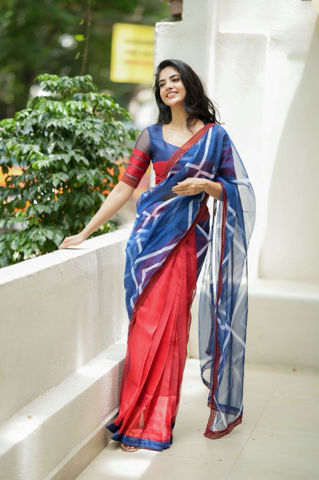 Blue maroon organza saree with patterned blouse