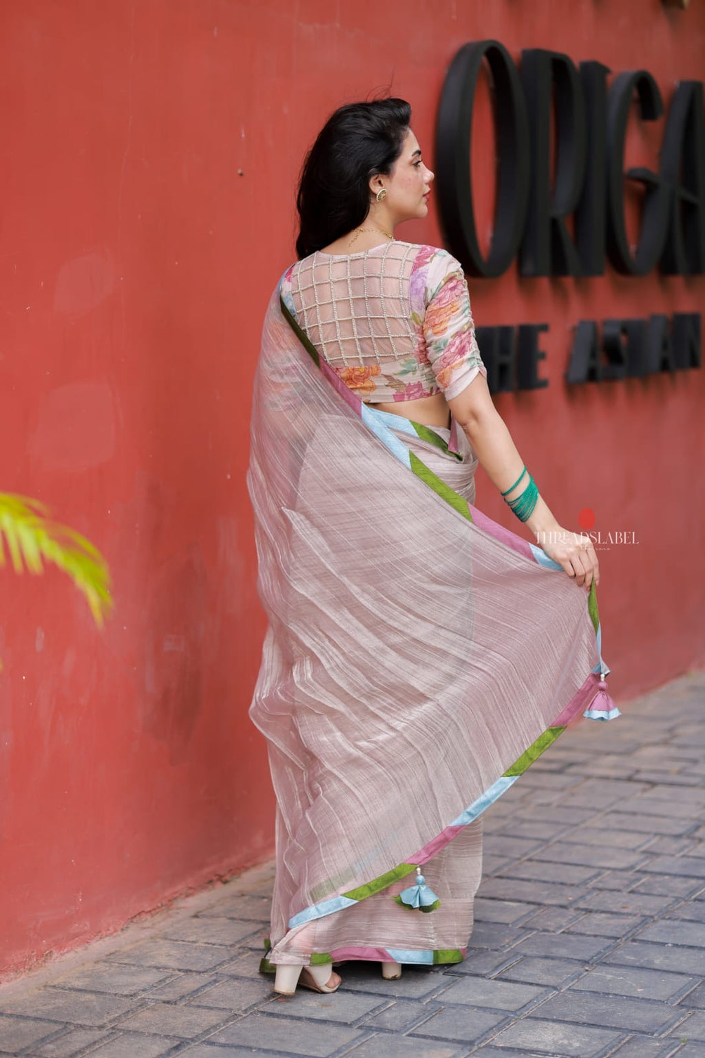 Dusty silver tissue saree with pearl hand work blouse