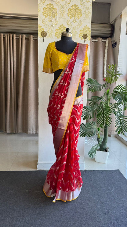 Red soft kota silk saree with yellow embroidered blouse