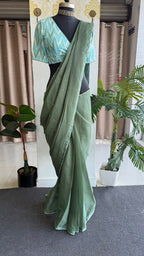 Green kota saree with blue cotton blouse
