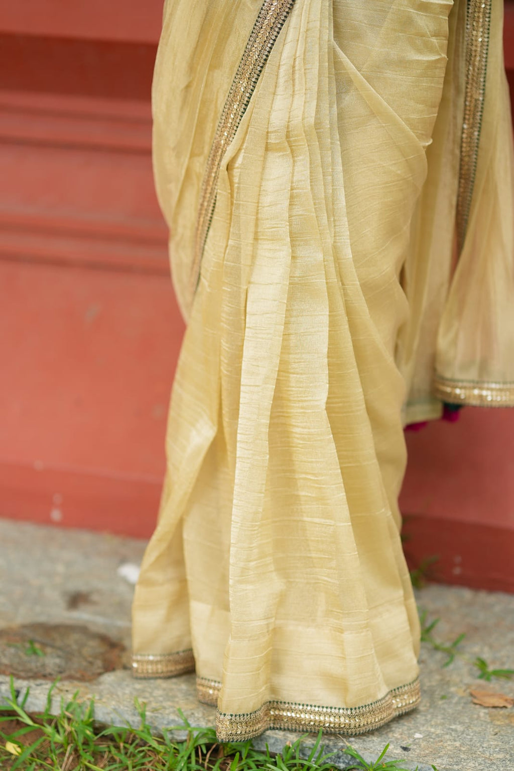 Gold tissue saree with green hand work blouse