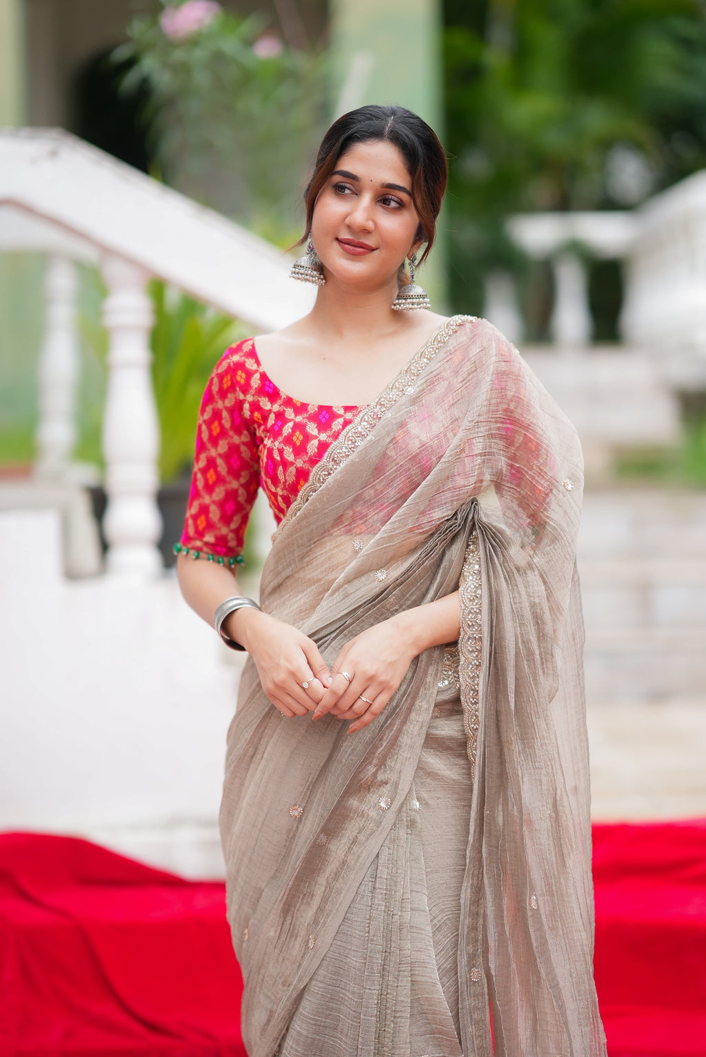 Grey tissue saree with red banarasi blouse