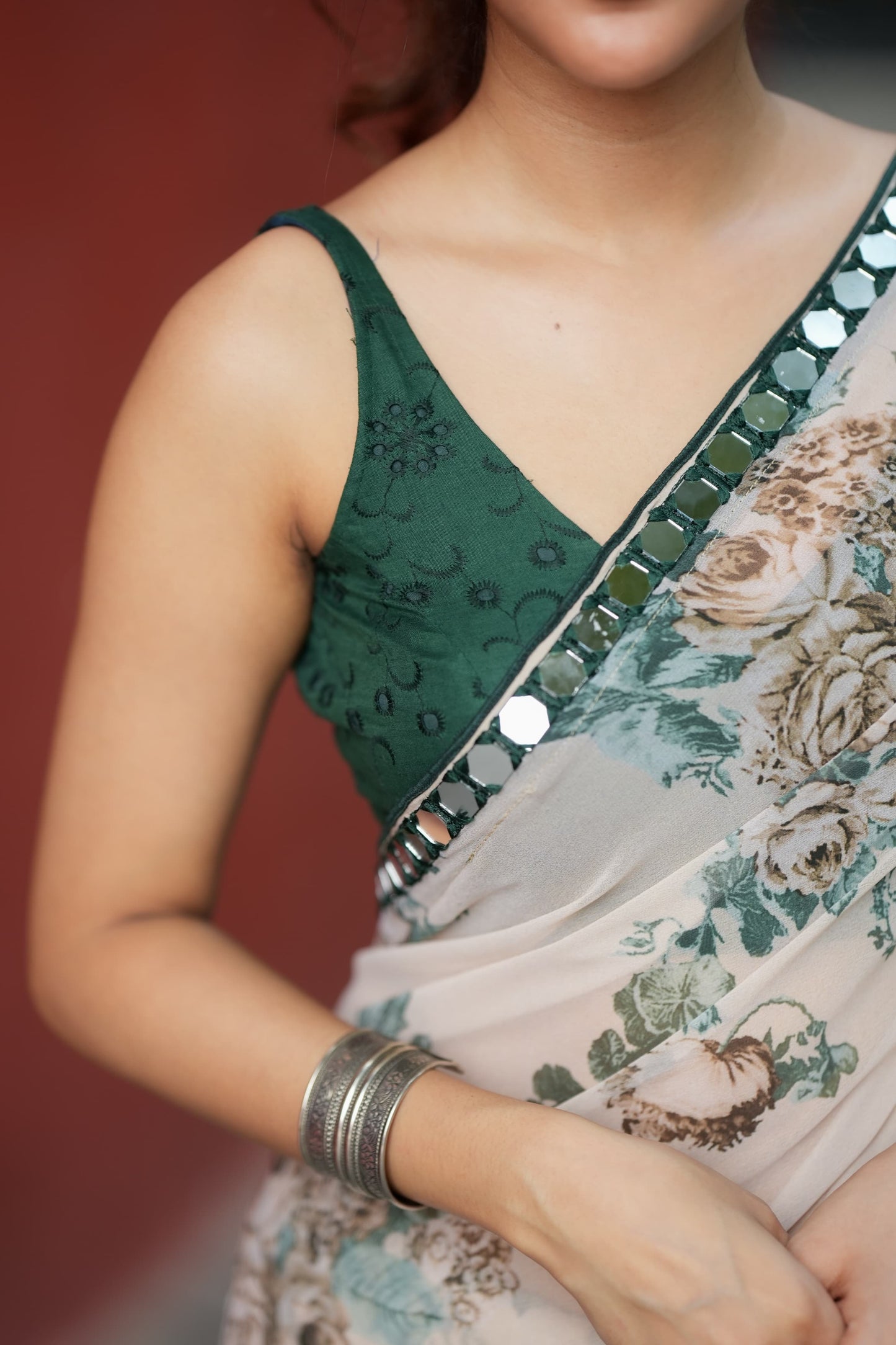 Half white chiffon floral saree with hand work blouse