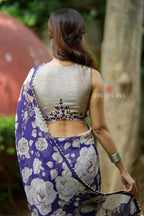 Purple chiffon floral saree with hand work blouse
