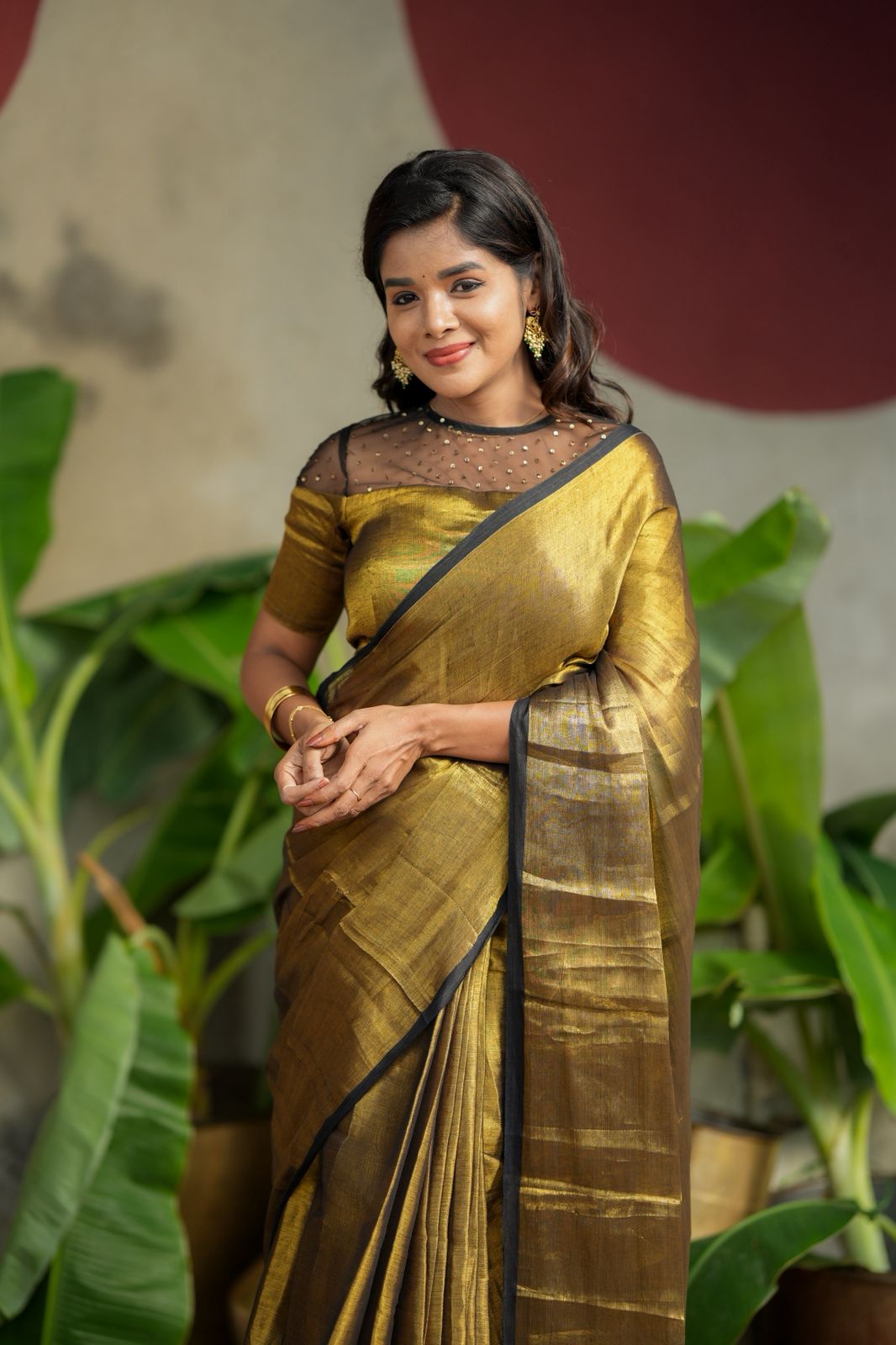 Golden soft tissue saree with hand work blouse
