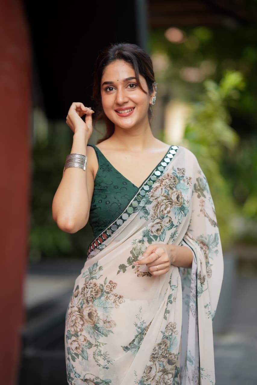 Half white chiffon floral saree with hand work blouse