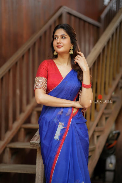 Blue organza cow with red hand work blouse