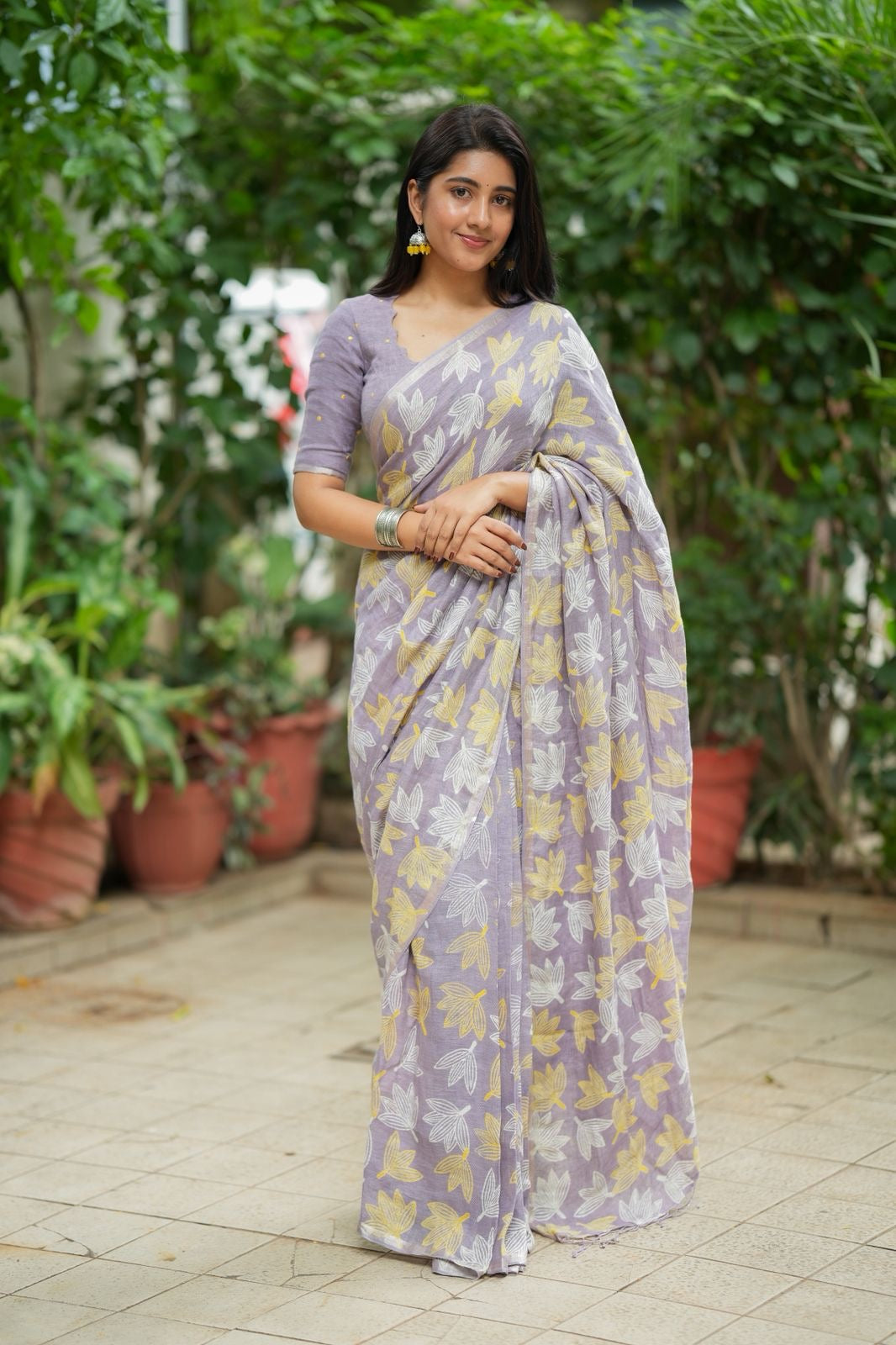 Lavender linen floral saree with hand work blouse