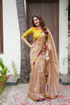 Antique gold tissue saree with parrot handwork blouse