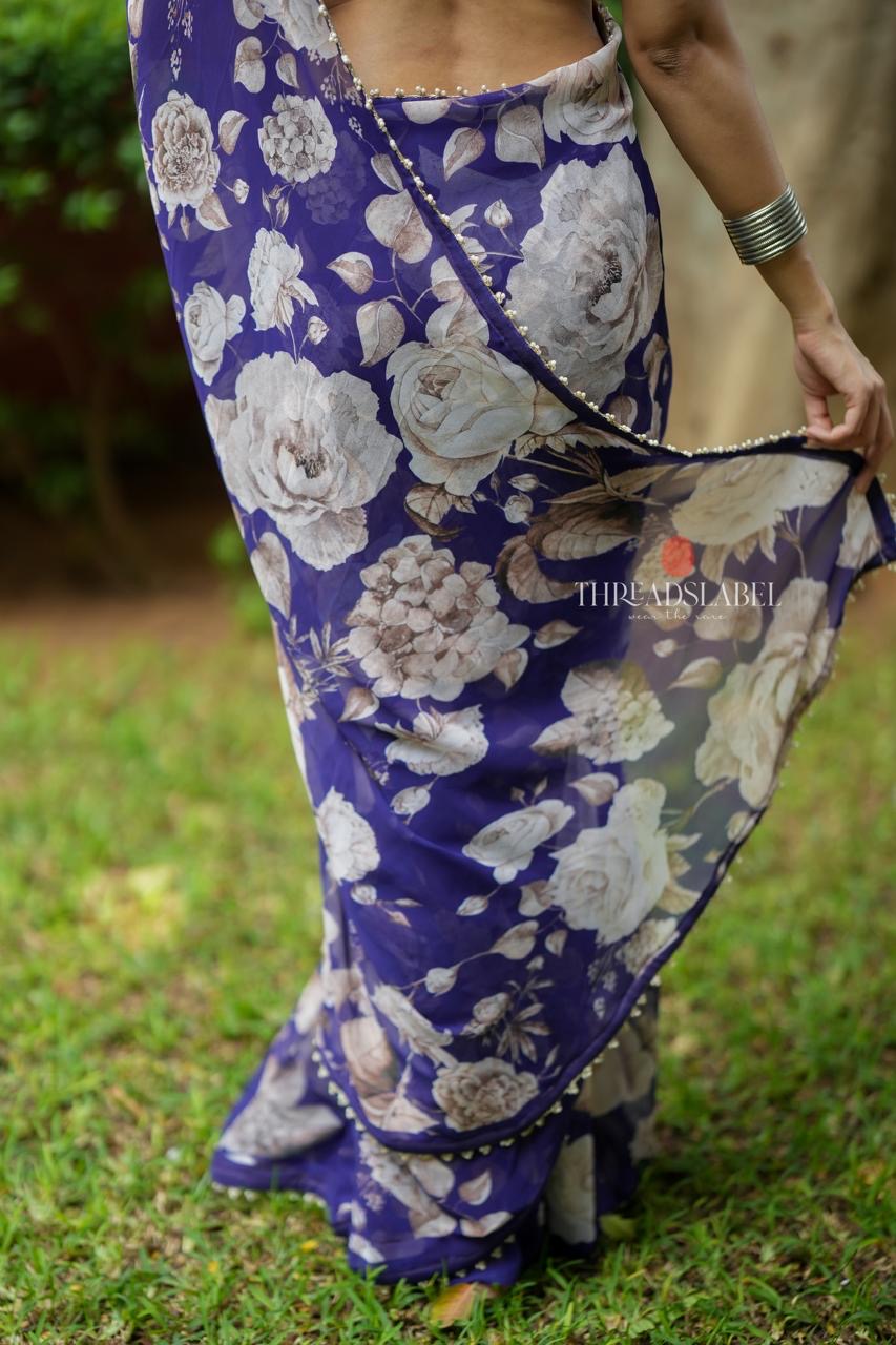 Purple chiffon floral saree with hand work blouse