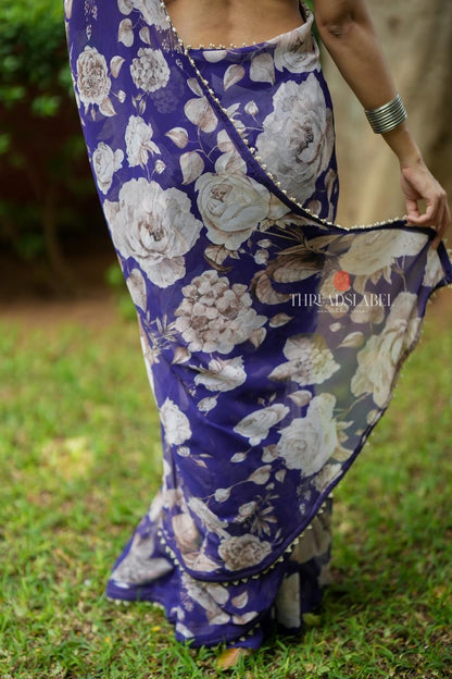 Purple chiffon floral saree with hand work blouse
