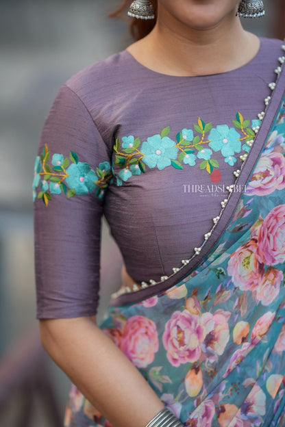 Blue floral georgette saree with grey embroidery blouse