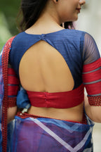 Blue maroon organza saree with patterned blouse