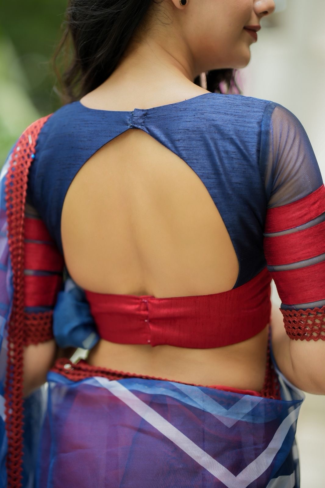 Blue maroon organza saree with patterned blouse