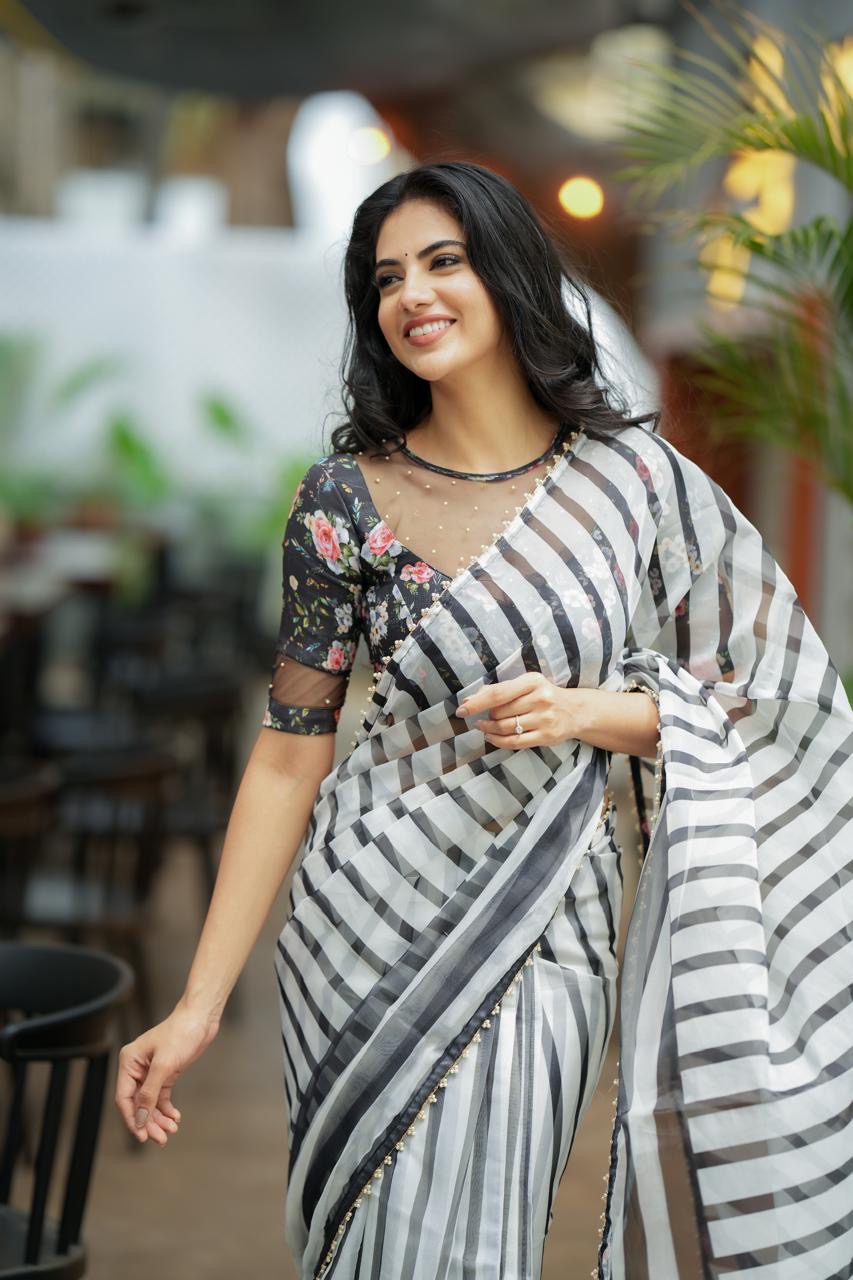 Black & white stripe organza saree with hand work blouse