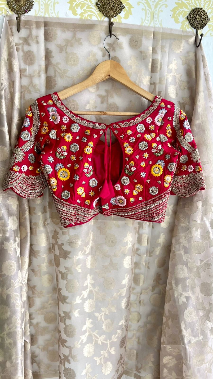 Half white banarasi saree with deep pink silk hand embroidery blouse